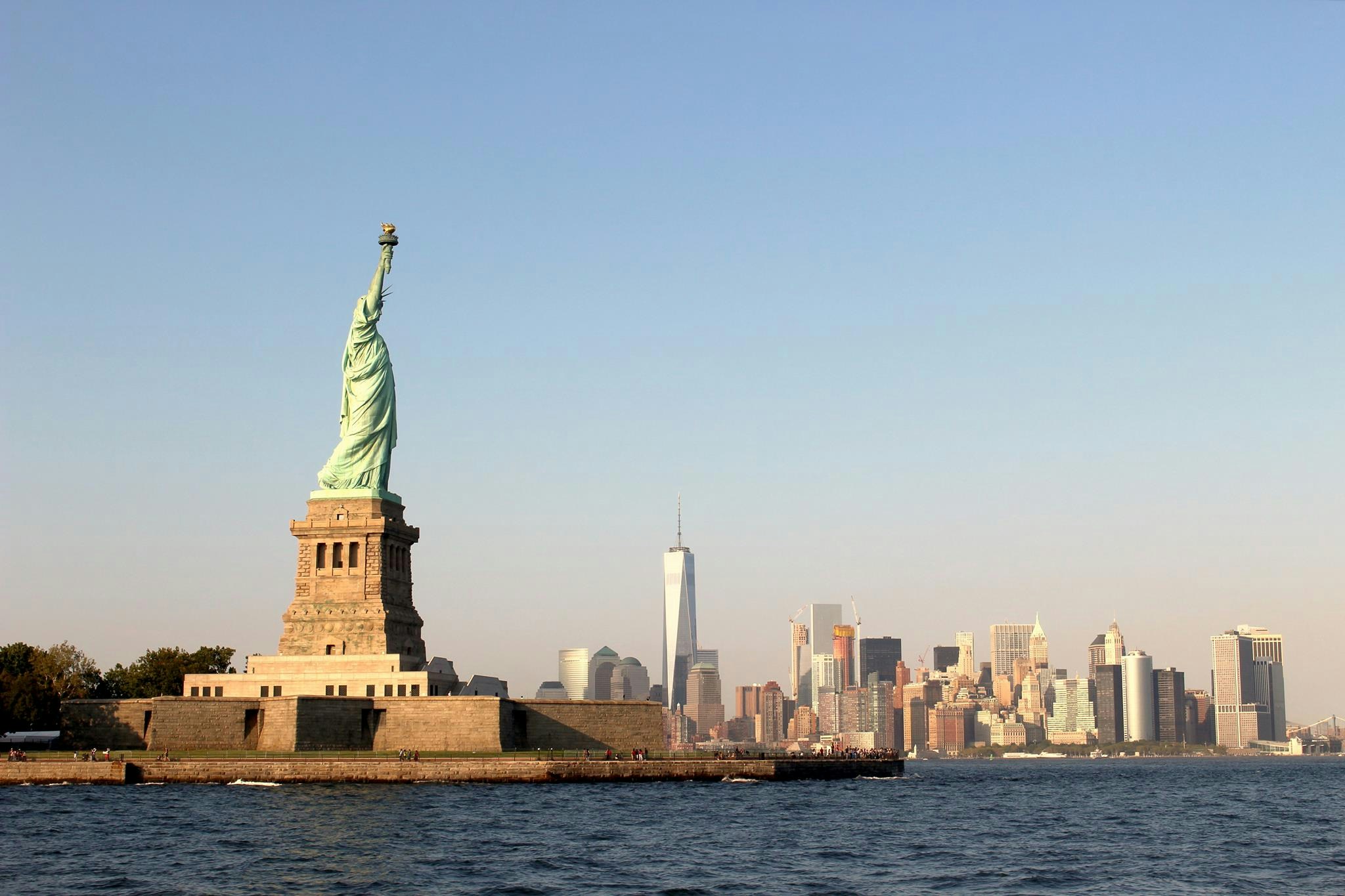 Statue of Liberty and New York City Skyline from a distance.