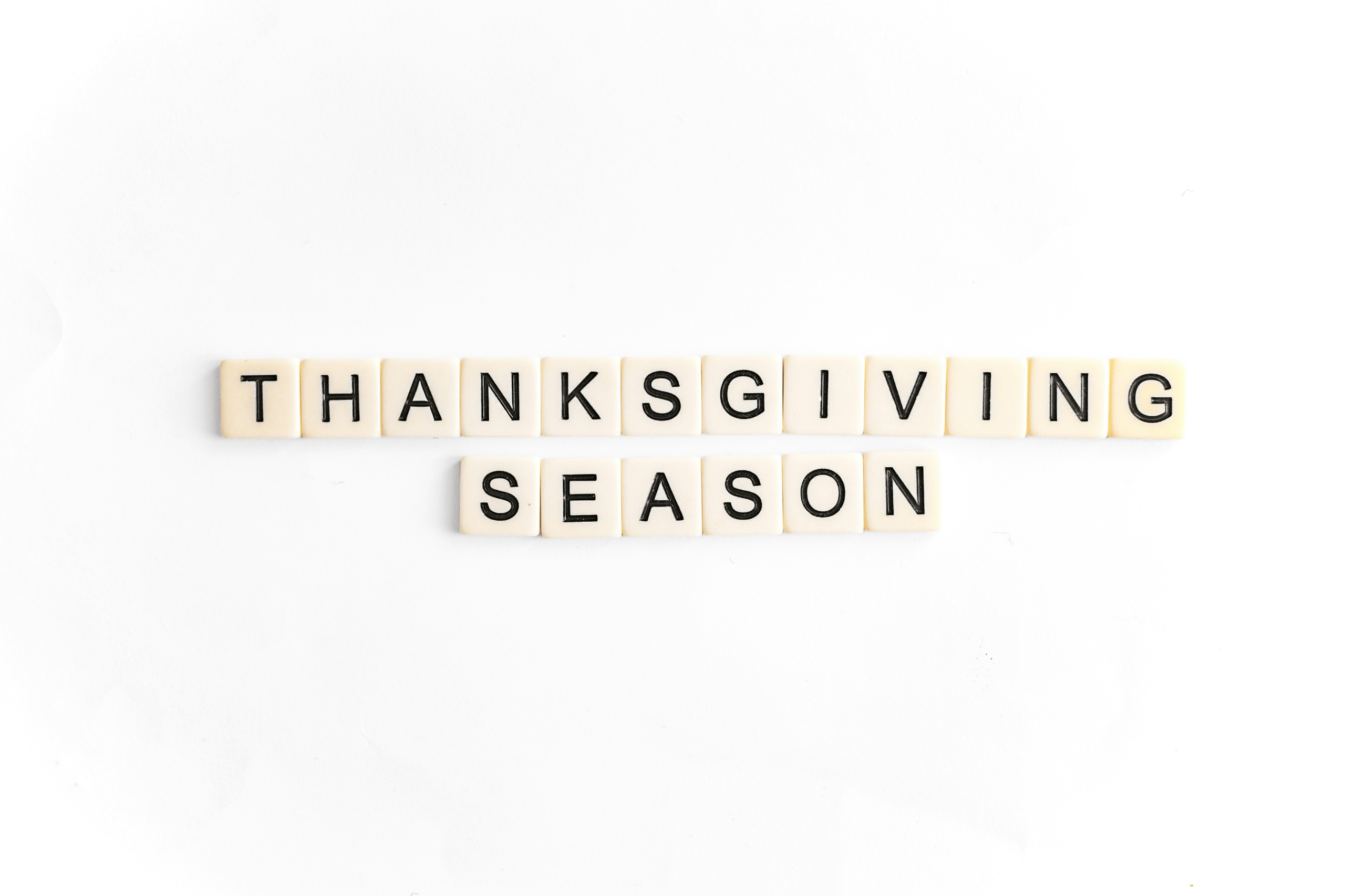 Scrabble tiles spelling out Thanksgiving Season